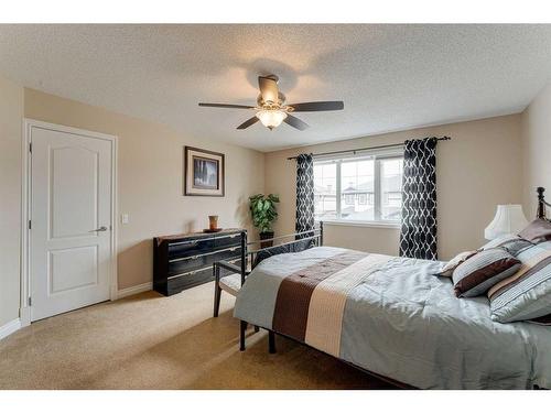 117 Springmere Grove, Chestermere, AB - Indoor Photo Showing Bedroom