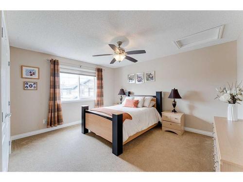 117 Springmere Grove, Chestermere, AB - Indoor Photo Showing Bedroom