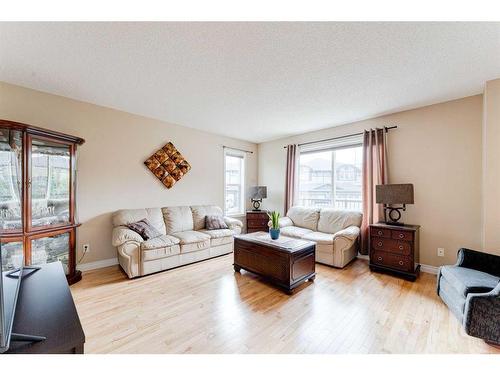 117 Springmere Grove, Chestermere, AB - Indoor Photo Showing Living Room