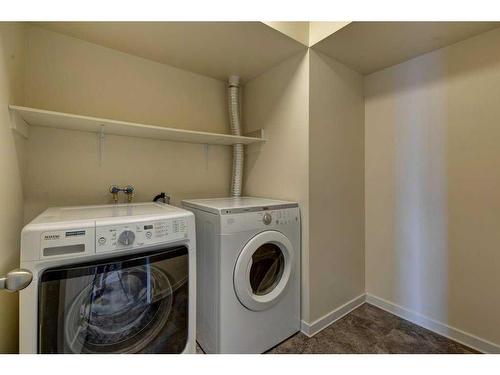 2201-1100 8 Avenue Sw, Calgary, AB - Indoor Photo Showing Laundry Room