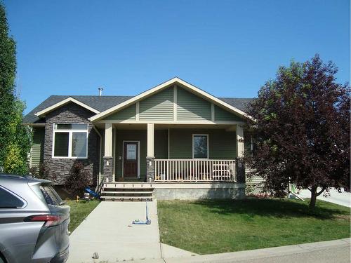 2 Evron Place, Trochu, AB - Outdoor With Deck Patio Veranda With Facade