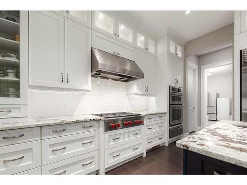 131 Leighton Lane, Rural Rocky View County, AB - Indoor Photo Showing Kitchen With Upgraded Kitchen