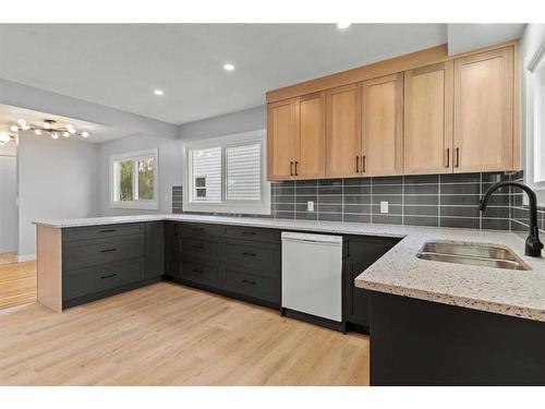 1219 Grey Street, Carstairs, AB - Indoor Photo Showing Kitchen With Double Sink