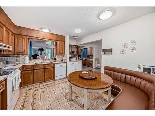 6023 Thornaby Way Nw, Calgary, AB - Indoor Photo Showing Kitchen With Double Sink