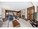 6023 Thornaby Way Nw, Calgary, AB  - Indoor Photo Showing Living Room With Fireplace 