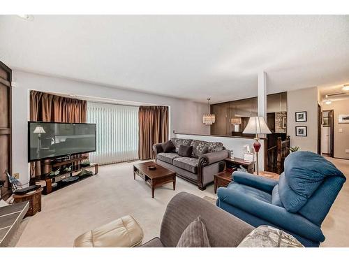 6023 Thornaby Way Nw, Calgary, AB - Indoor Photo Showing Living Room