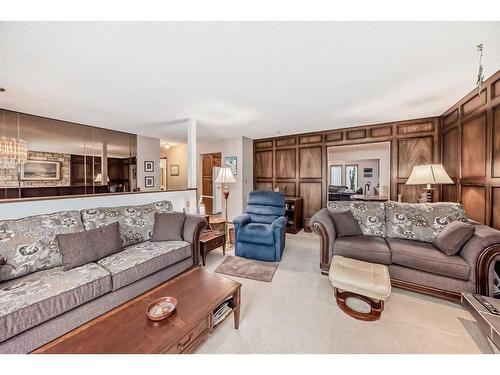 6023 Thornaby Way Nw, Calgary, AB - Indoor Photo Showing Living Room