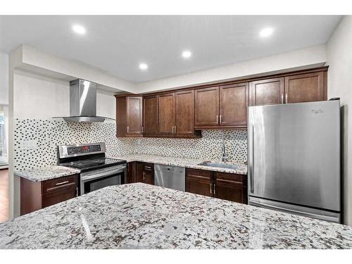 109-335 Garry Crescent Ne, Calgary, AB - Indoor Photo Showing Kitchen With Stainless Steel Kitchen With Upgraded Kitchen