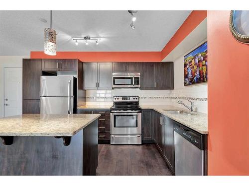 1204-279 Copperpond Common Se, Calgary, AB - Indoor Photo Showing Kitchen With Stainless Steel Kitchen With Upgraded Kitchen