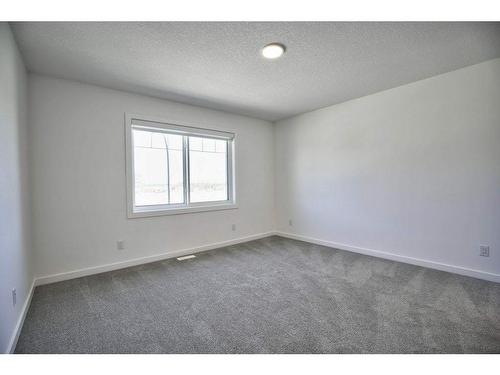 70 Legacy Reach Bay Se, Calgary, AB - Indoor Photo Showing Other Room