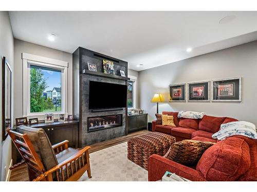 51 Timberline Point Sw, Calgary, AB - Indoor Photo Showing Living Room With Fireplace