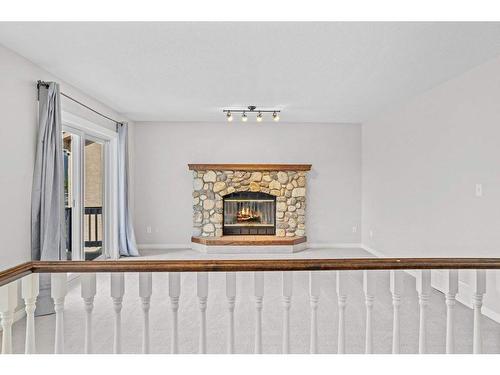 3 Ridge Road, Canmore, AB - Indoor With Fireplace