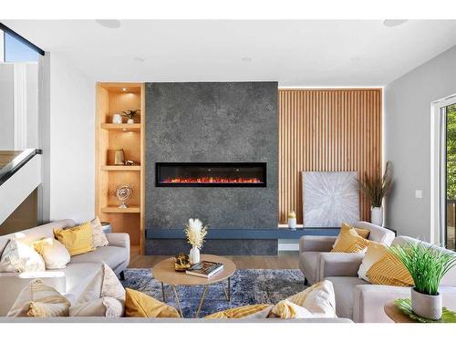 632 26 Avenue Nw, Calgary, AB - Indoor Photo Showing Living Room With Fireplace