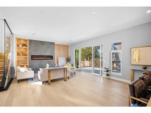 632 26 Avenue Nw, Calgary, AB - Indoor Photo Showing Other Room With Fireplace