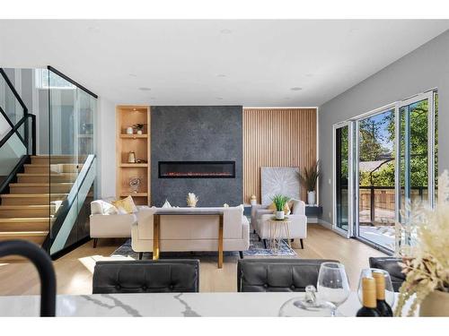 632 26 Avenue Nw, Calgary, AB - Indoor Photo Showing Living Room With Fireplace