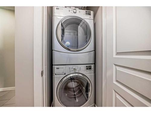 1901-1320 1 Street Se, Calgary, AB - Indoor Photo Showing Laundry Room