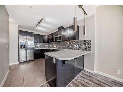 1901-1320 1 Street Se, Calgary, AB - Indoor Photo Showing Kitchen With Upgraded Kitchen