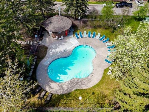 208-3339 Rideau Place Sw, Calgary, AB - Outdoor With In Ground Pool