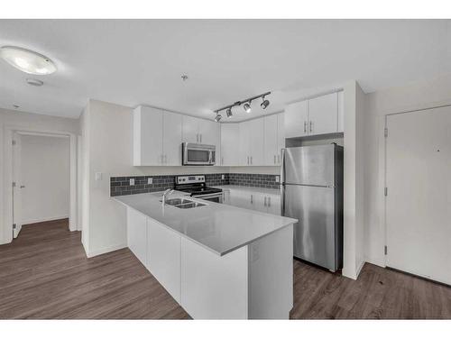 2208-181 Skyview Ranch Manor Ne, Calgary, AB - Indoor Photo Showing Kitchen With Stainless Steel Kitchen With Double Sink