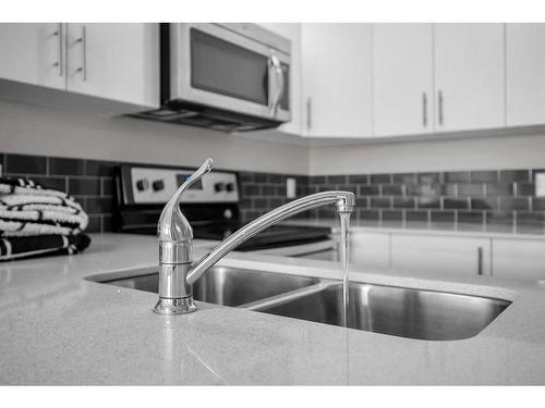 2208-181 Skyview Ranch Manor Ne, Calgary, AB - Indoor Photo Showing Kitchen With Double Sink