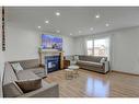 28 Tarawood Grove Ne, Calgary, AB  - Indoor Photo Showing Living Room With Fireplace 