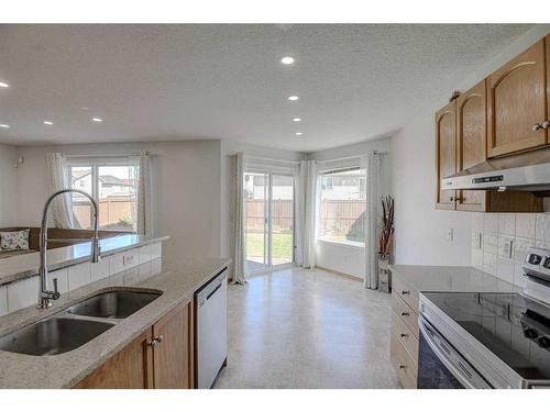 28 Tarawood Grove Ne, Calgary, AB - Indoor Photo Showing Kitchen With Double Sink With Upgraded Kitchen