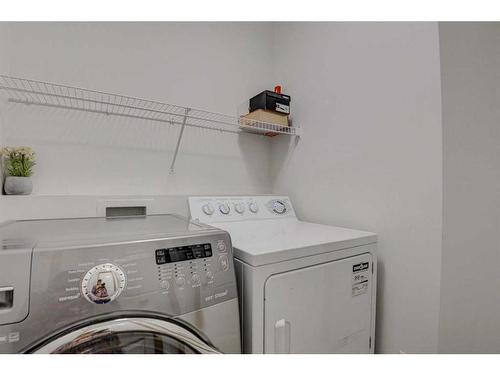 28 Tarawood Grove Ne, Calgary, AB - Indoor Photo Showing Laundry Room