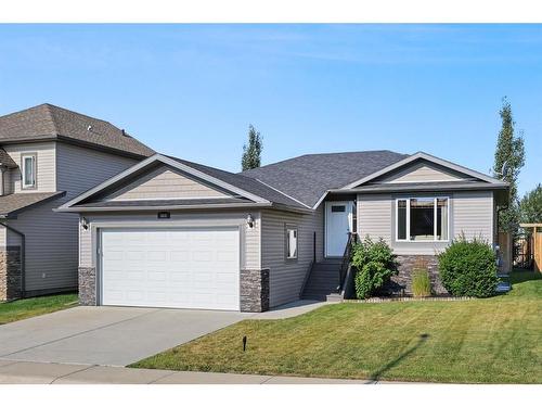 669 West Highland Crescent, Carstairs, AB - Outdoor With Facade