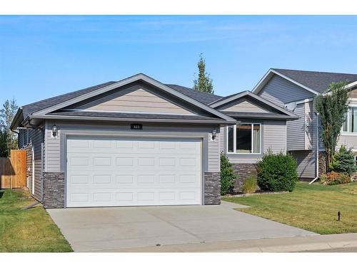 669 West Highland Crescent, Carstairs, AB - Outdoor With Facade