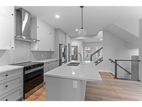 3187 Chinook Winds Drive Sw, Airdrie, AB - Indoor Photo Showing Kitchen With Stainless Steel Kitchen With Double Sink With Upgraded Kitchen