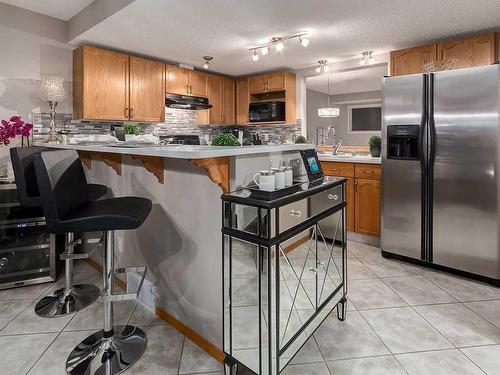 22 Lincoln Green Sw, Calgary, AB - Indoor Photo Showing Kitchen With Stainless Steel Kitchen With Upgraded Kitchen