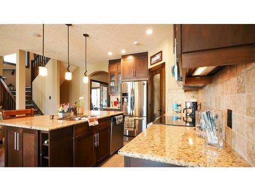 103 Everoak Green Sw, Calgary, AB - Indoor Photo Showing Kitchen With Stainless Steel Kitchen With Double Sink With Upgraded Kitchen