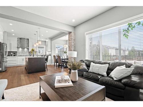 88 Rainbow Falls Blvd, Chestermere, AB - Indoor Photo Showing Living Room