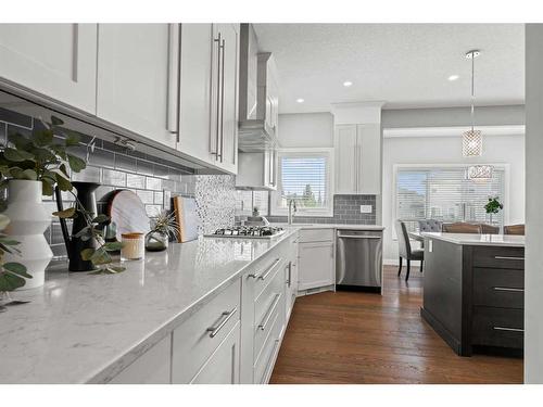 88 Rainbow Falls Blvd, Chestermere, AB - Indoor Photo Showing Kitchen With Upgraded Kitchen