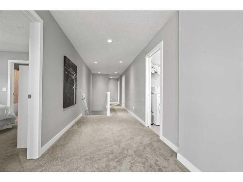 88 Rainbow Falls Blvd, Chestermere, AB - Indoor Photo Showing Other Room