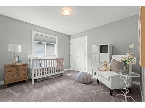 88 Rainbow Falls Blvd, Chestermere, AB - Indoor Photo Showing Bedroom