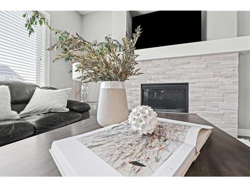 88 Rainbow Falls Blvd, Chestermere, AB - Indoor With Fireplace