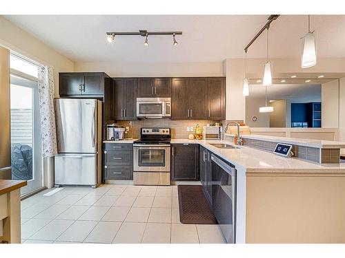 226 Nolanfield Villas Nw, Calgary, AB - Indoor Photo Showing Kitchen With Stainless Steel Kitchen With Double Sink With Upgraded Kitchen