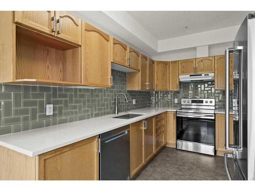 221-223 Tuscany Springs Boulevard Nw, Calgary, AB - Indoor Photo Showing Kitchen With Stainless Steel Kitchen