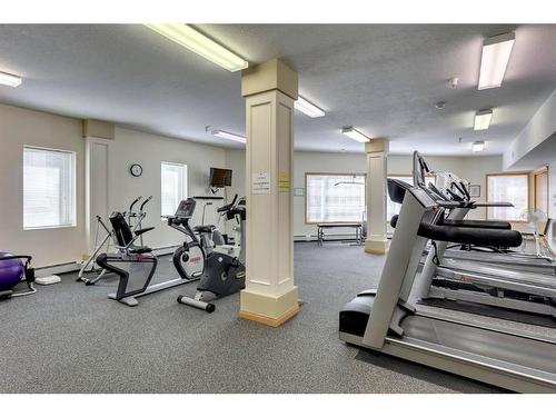 221-223 Tuscany Springs Boulevard Nw, Calgary, AB - Indoor Photo Showing Gym Room