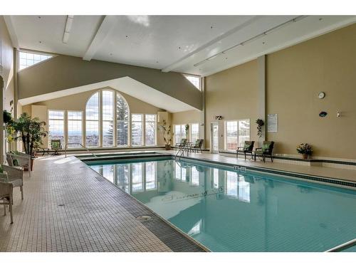 221-223 Tuscany Springs Boulevard Nw, Calgary, AB - Indoor Photo Showing Other Room With In Ground Pool