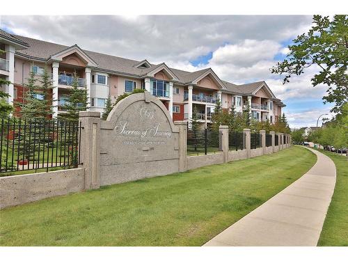 221-223 Tuscany Springs Boulevard Nw, Calgary, AB - Outdoor With Facade