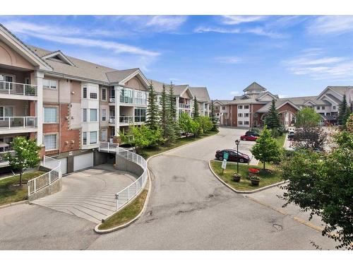 221-223 Tuscany Springs Boulevard Nw, Calgary, AB - Outdoor With Balcony With Facade