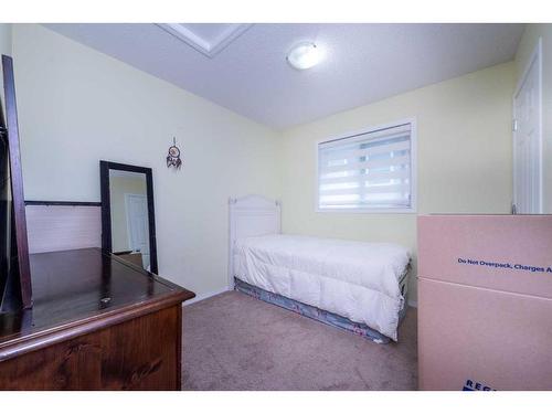 34 Walden Crescent Se, Calgary, AB - Indoor Photo Showing Bedroom