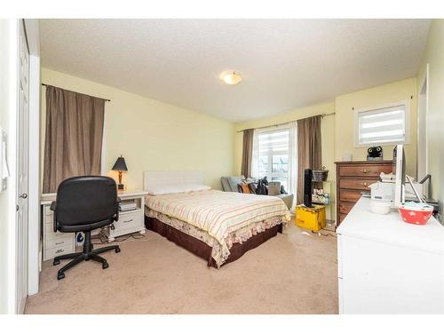 34 Walden Crescent Se, Calgary, AB - Indoor Photo Showing Bedroom