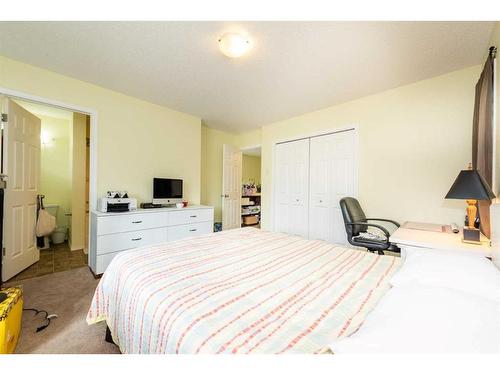 34 Walden Crescent Se, Calgary, AB - Indoor Photo Showing Bedroom