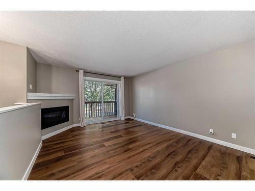 71 Templemont Road, Calgary, AB - Indoor With Fireplace