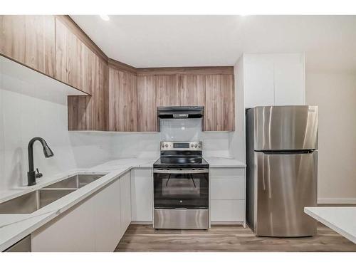 402 Templeview Drive Ne, Calgary, AB - Indoor Photo Showing Kitchen With Double Sink With Upgraded Kitchen