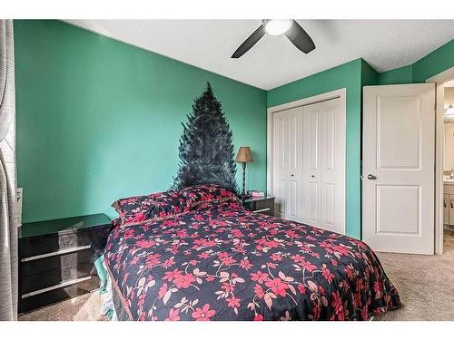 2098 High Country Rise Nw, High River, AB - Indoor Photo Showing Bedroom