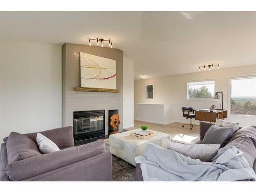 150 Elbow River Road, Rural Rocky View County, AB - Indoor Photo Showing Living Room With Fireplace